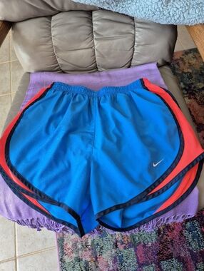 Nike Bright Blue Women's Athletic Running Shorts with Orange Trim